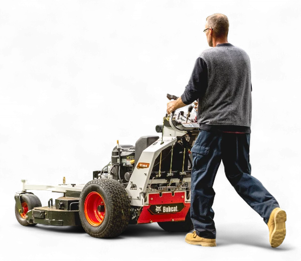Bobcat WB07 rear view with male operator
